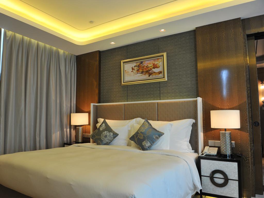 Hotel Ramada Plaza Liuzhou Liudong Zimmer foto